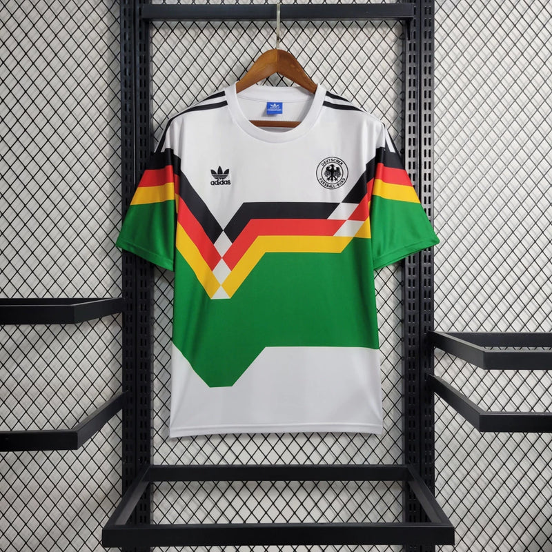 Camisa Alemanha Home I 1990/91 Adidas Retrô Masculina branca com detalhes em preto, vermelho e amarelo – modelo clássico de colecionador, ideal para torcedores e fãs de camisas históricas de futebol.
