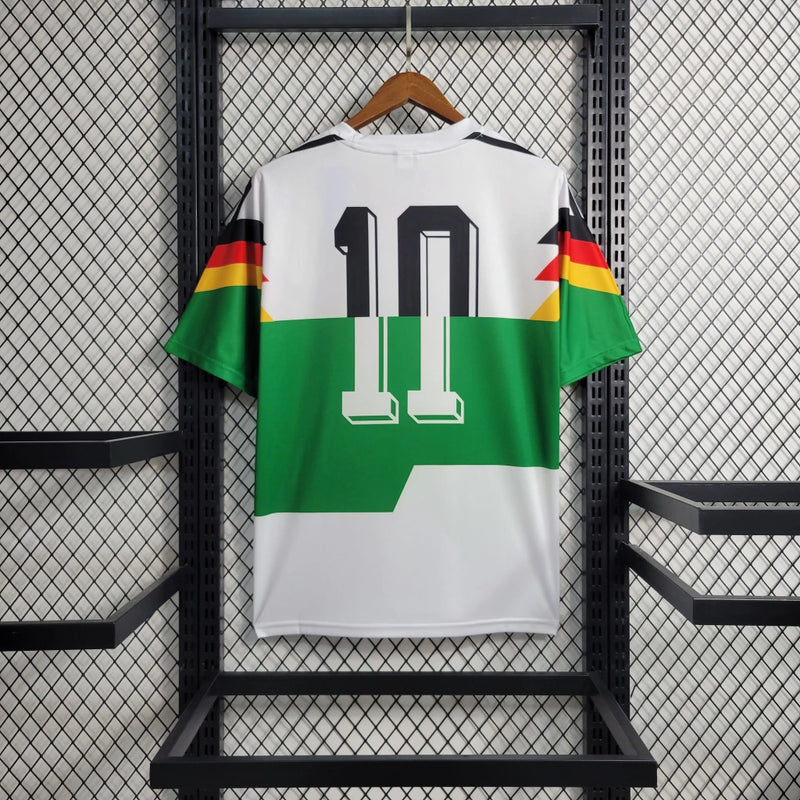 Camisa Alemanha Home I 1990/91 Adidas Retrô Masculina branca com detalhes em preto, vermelho e amarelo – modelo clássico de colecionador, ideal para torcedores e fãs de camisas históricas de futebol.