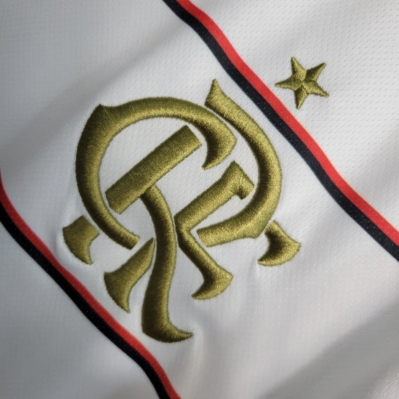 Regata Flamengo II 2023/24 Adidas Masculina branca com detalhes em preto e vermelho, escudo CRF e logo Adidas Bordados no peito, modelo ideal para treinos e uso casual”