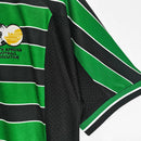 Camisa Retrô Seleção África do Sul Copa 1998 Torcedor Masculina - modelo preto, inspirado no uniforme clássico de 1998, escudo da seleção em destaque e design nostálgico para colecionadores e torcedores.