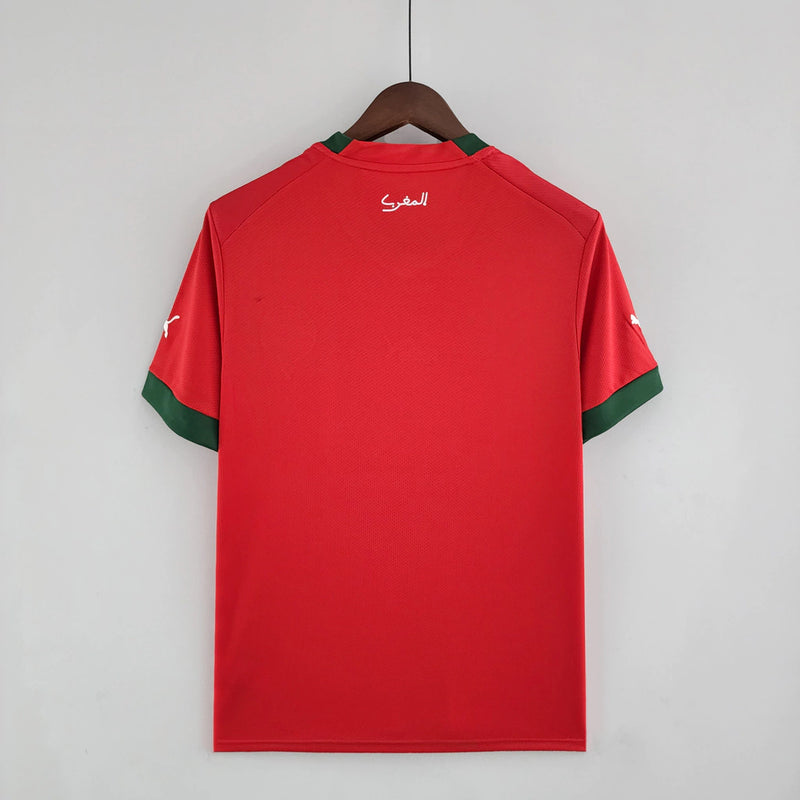 Camisa Marrocos 2022/23 Home I Torcedor Masculina - modelo vermelho, uniforme principal da seleção marroquina, escudo em destaque e design clássico para os torcedores.