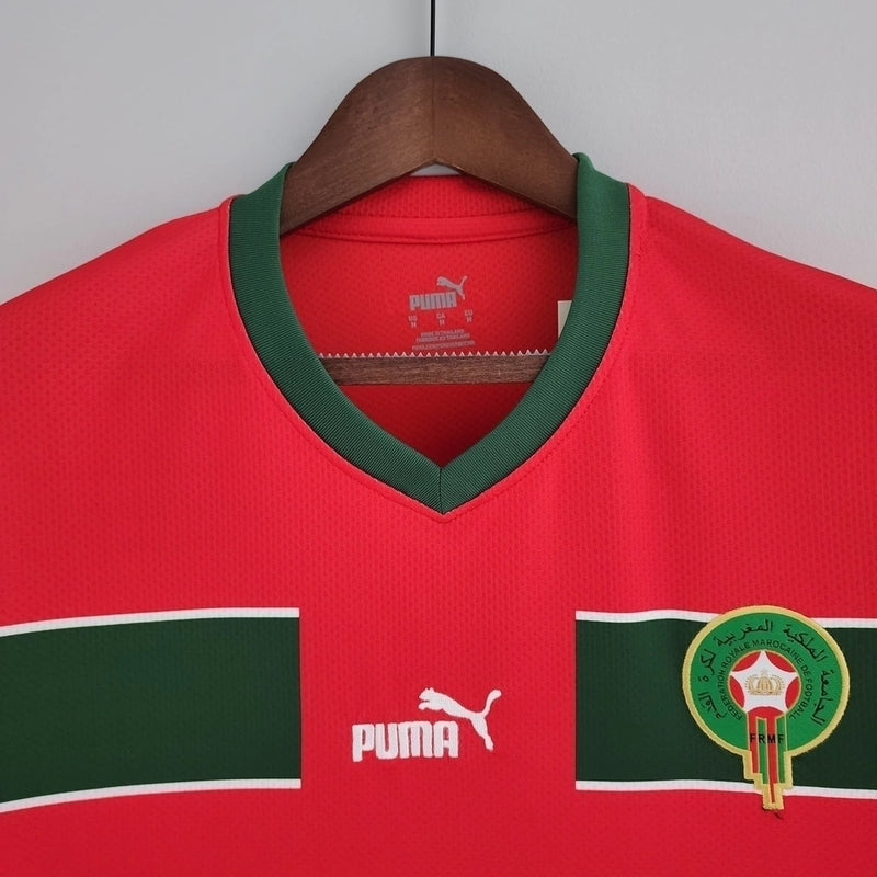 Camisa Marrocos 2022/23 Home I Torcedor Masculina - modelo vermelho, uniforme principal da seleção marroquina, escudo em destaque e design clássico para os torcedores.