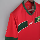Camisa Marrocos 2022/23 Home I Torcedor Masculina - modelo vermelho, uniforme principal da seleção marroquina, escudo em destaque e design clássico para os torcedores.