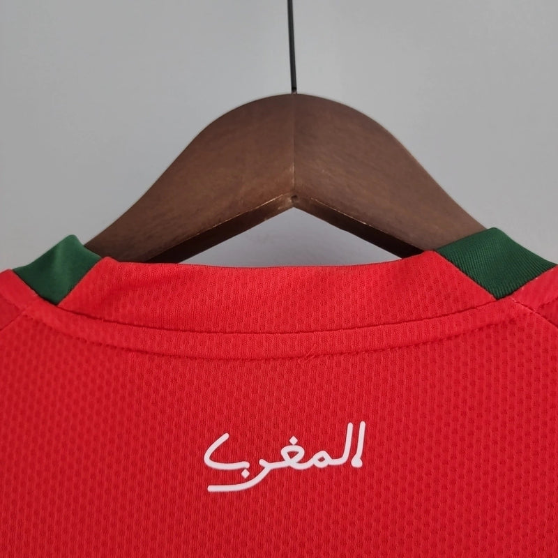 Camisa Marrocos 2022/23 Home I Torcedor Masculina - modelo vermelho, uniforme principal da seleção marroquina, escudo em destaque e design clássico para os torcedores.