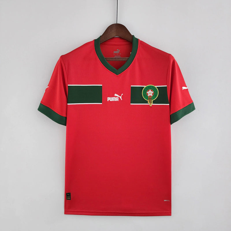 Camisa Marrocos 2022/23 Home I Torcedor Masculina - modelo vermelho, uniforme principal da seleção marroquina, escudo em destaque e design clássico para os torcedores.