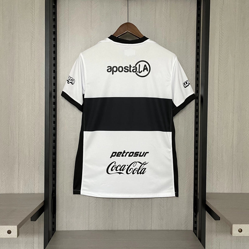 Camisa Olimpia Home I 2025/26 Nike Torcedor Masculina - modelo branco, uniforme principal do clube paraguaio, escudo em destaque e design moderno 