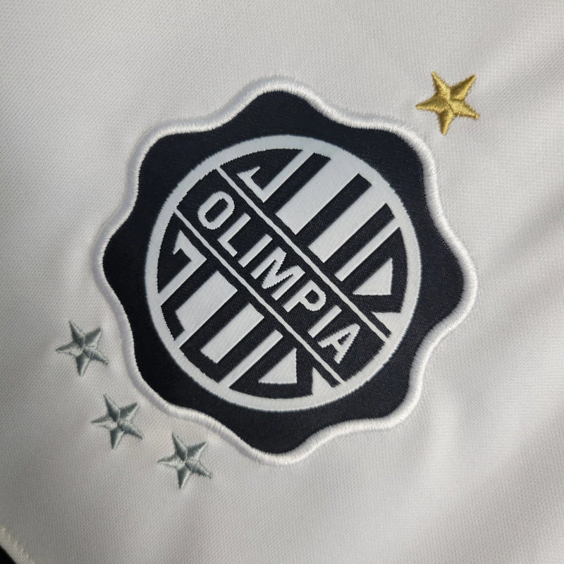 Camisa Olimpia Home I 2023/24 Nike Torcedor Masculina - modelo branco, uniforme principal do clube paraguaio, escudo em destaque e design clássico 
