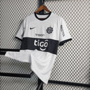 Camisa Olimpia Home I 2023/24 Nike Torcedor Masculina - modelo branco, uniforme principal do clube paraguaio, escudo em destaque e design clássico 
