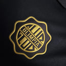 Camisa Olimpia Especial 120 Anos 2022/23 Nike Jogador Masculina - modelo preto com detalhes dourados, edição comemorativa de aniversário do clube paraguaio, escudo em destaque e design exclusivo 