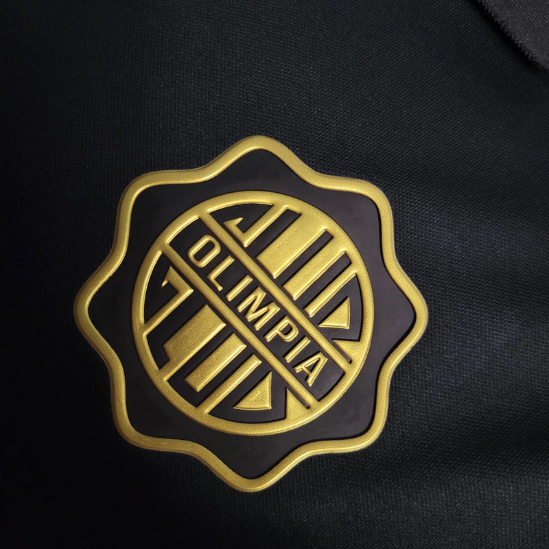 Camisa Olimpia Especial 120 Anos 2022/23 Nike Jogador Masculina - modelo preto com detalhes dourados, edição comemorativa de aniversário do clube paraguaio, escudo em destaque e design exclusivo 