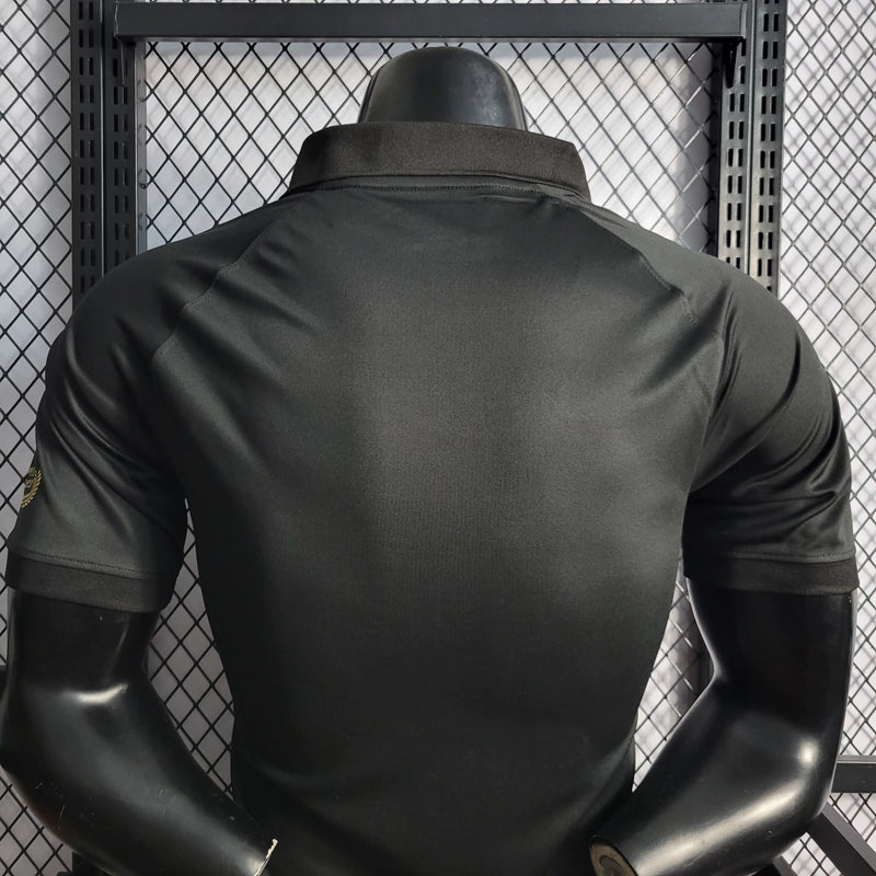 Camisa Olimpia Especial 120 Anos 2022/23 Nike Jogador Masculina - modelo preto com detalhes dourados, edição comemorativa de aniversário do clube paraguaio, escudo em destaque e design exclusivo 