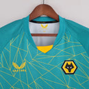 Camisa Wolverhampton Away II 2022/23 Torcedor Masculina - modelo verde, uniforme de visitante dos Wolves, escudo em destaque e design moderno para os torcedores.