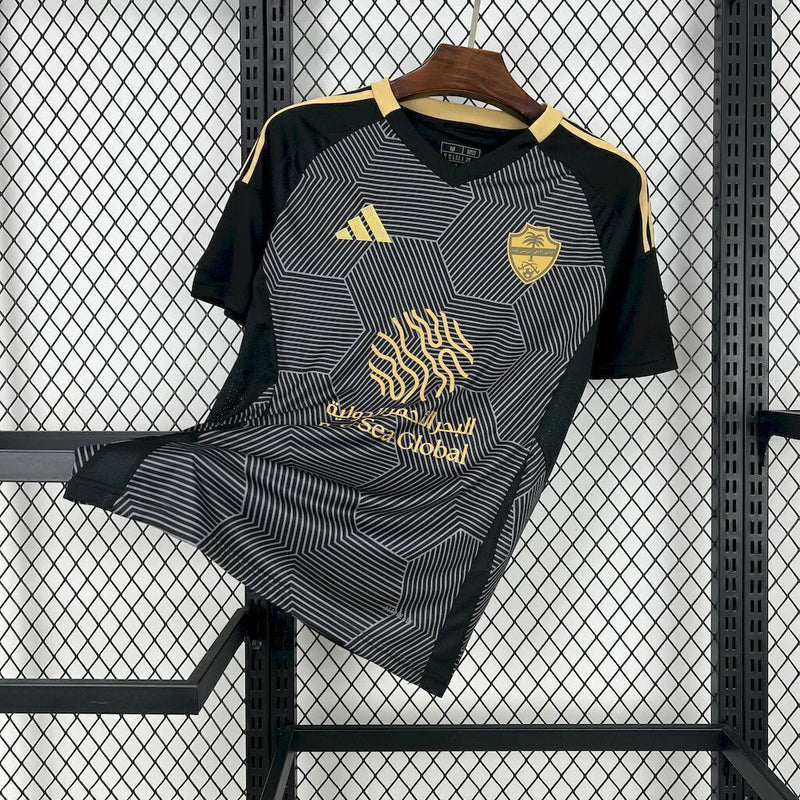 Texto alternativo (alt text):
Camisa Al-Ahli Third (3) 2024/25 Adidas Torcedor Masculina com design moderno em cores contrastantes, escudo oficial estampado e tecido leve com tecnologia Aeroready para alta respirabilidade.

