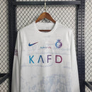 Camisa Al-Nassr Third (3) 2023/24 Nike Torcedor Manga Longa Masculina na cor preta com detalhes dourados, escudo do clube e logo da Nike em destaque"