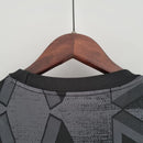 Camisa Arsenal Away II 2022/23 Adidas Torcedor Masculina preta com design esportivo e escudo aplicado.