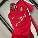 Camisa Arsenal Home I 2008/09 Nike Retrô Masculina vermelha com mangas brancas, escudo bordado e gola redonda clássica.