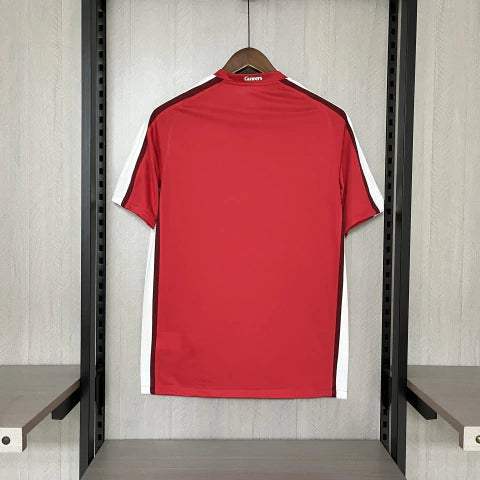 Camisa Arsenal Home I 2008/09 Nike Retrô Masculina vermelha com mangas brancas, escudo bordado e gola redonda clássica.