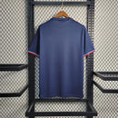 Camisa Arsenal The France Pack 2023/24 Adidas Torcedor Masculina azul com detalhes vermelhos e brancos, escudo aplicado e tecido leve AEROREADY.