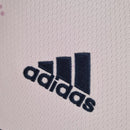 Camisa Arsenal Third III 2022/23 Adidas Torcedor Masculina rosa com detalhes esportivos e escudo aplicado.