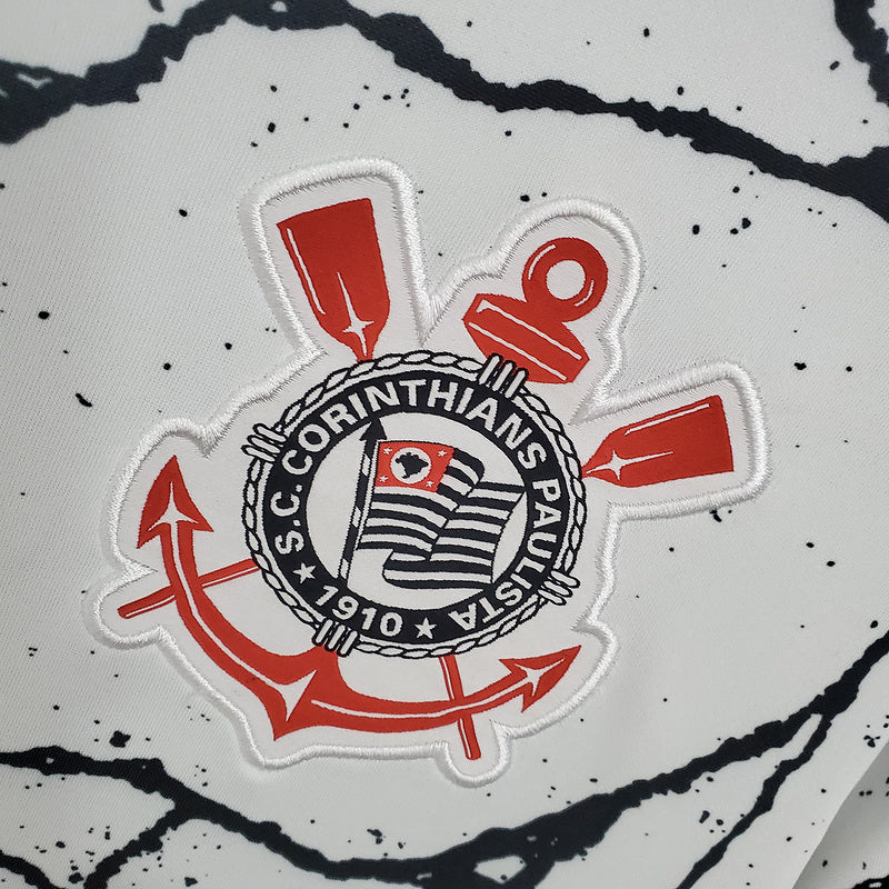 Camisa Corinthians Home I 2021/22 Nike Torcedor Masculina na cor branca com detalhes pretos e escudo bordado no peito, ideal para torcedores do timão 