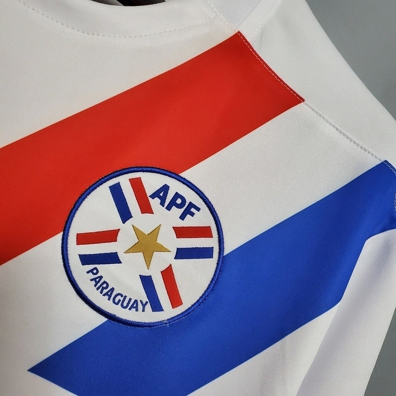 Compre a Camisa paraguai away 2020/21 Puma Torcedor masculina branca com detalhes vermelho e azul