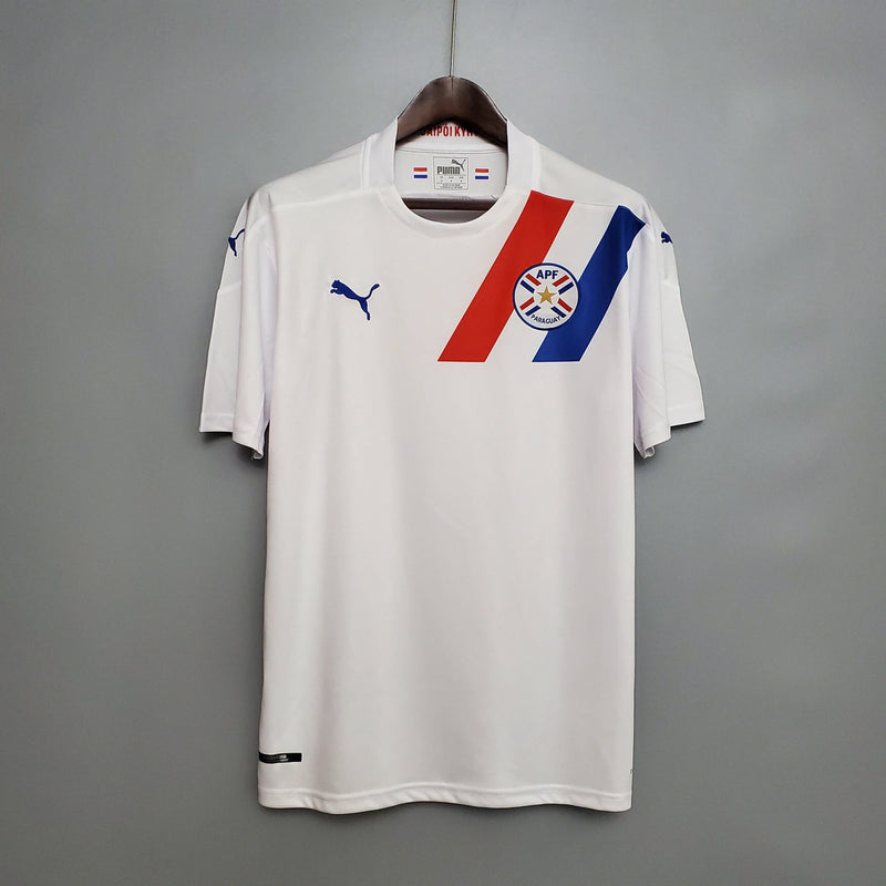 Compre a Camisa paraguai away 2020/21 Puma Torcedor masculina branca com detalhes vermelho e azul