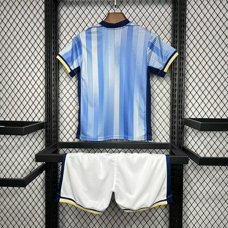 Kit Infantil Tottenham Away (2) 2024/25 Nike preto e roxo – conjunto oficial com camisa e short, tecido leve e respirável para crianças de 3 a 13 anos."

