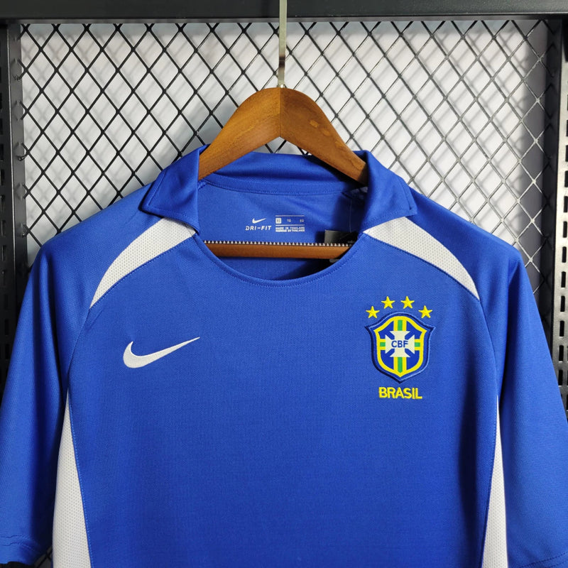 Uniforme retrô Brasil 2002 Nike Away II masculina azul para torcedores e colecionadores