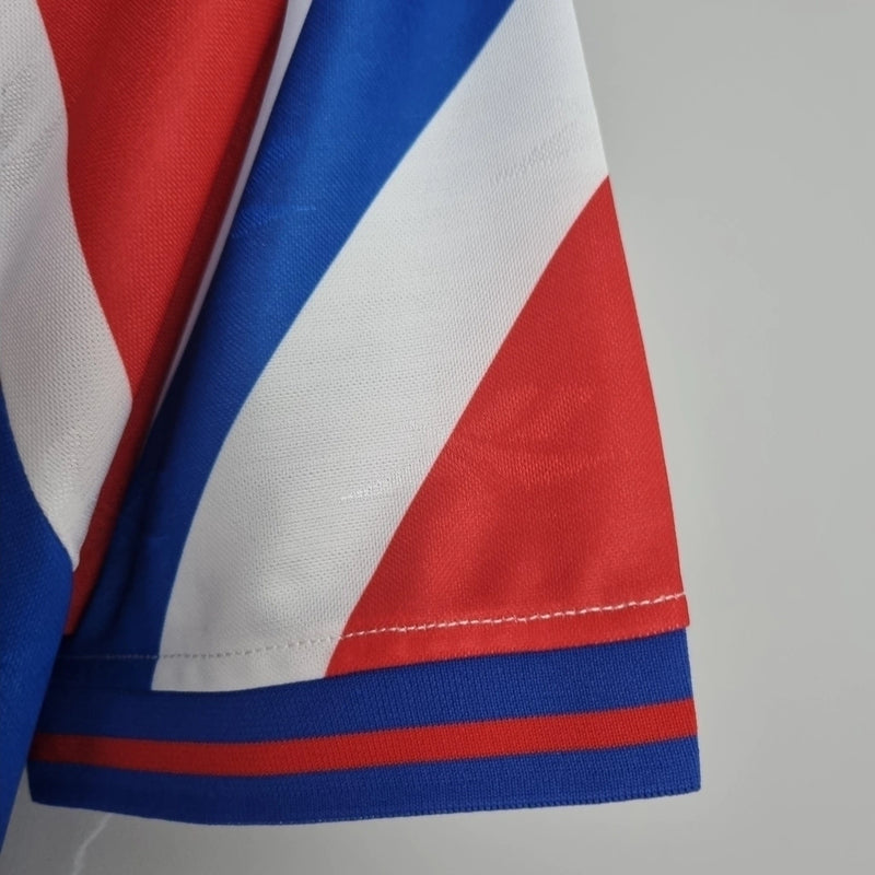 Camisa Retrô Universidad Católica Away II 1984/85 Reebok Masculina vermelha, uniforme histórico do futebol chileno com escudo da Católica no peito, design clássico retrô, ideal para torcedores e colecionadores.