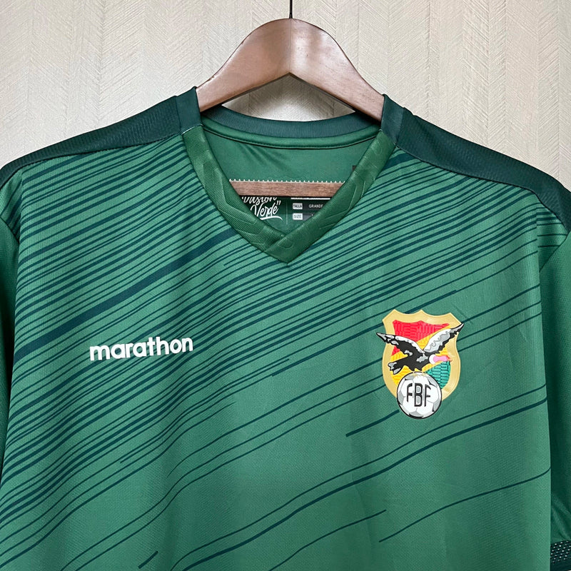 Camisa Bolívia Home I 2023/24 Torcedor Masculina verde, com detalhes inspirados na bandeira boliviana, tecido leve e confortável para torcedores da La Verde
Camisa Bolívia Home I 2023/24
Camisa Bolívia 2023/24 masculina
Camisa seleção Bolívia 2023
Camisa Bolívia verde torcedor
Camisa Bolívia La Verde
Camisa Bolívia masculina 2023/24
Camisa Bolívia nova coleção
Camisa Bolívia futebol 2023/24