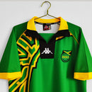 Camisa Jamaica Away II 1998/99 Kappa Retrô Masculina verde – uniforme clássico da seleção jamaicana com design histórico, escudo bordado e logo Kappa, ideal para colecionadores e fãs de futebol retrô."