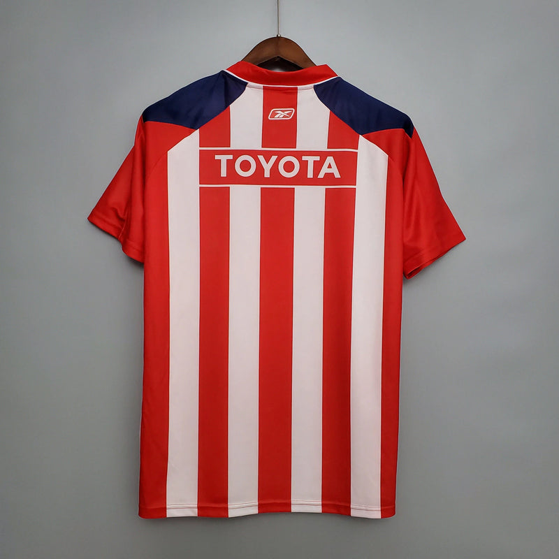 Camisa Chivas Guadalajara Home I 2006/07 Reebok Retrô Masculina Vermelha e Branca, uniforme clássico, escudo bordado, futebol mexicano, retrô colecionável"