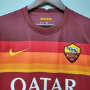Camisa Roma Home I 2020/21 Nike Retrô Masculina grená, com detalhes em amarelo e laranja, gola polo e escudo bordado da Roma