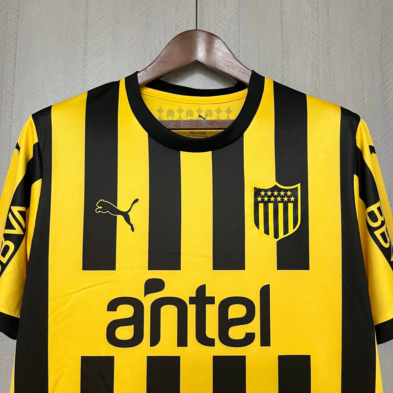 Camisa Peñarol Home I 2024/25 Torcedor Masculina Amarela e Preta, uniforme clássico, futebol uruguaio, escudo bordado, conforto, estilo e tradição para torcedores"