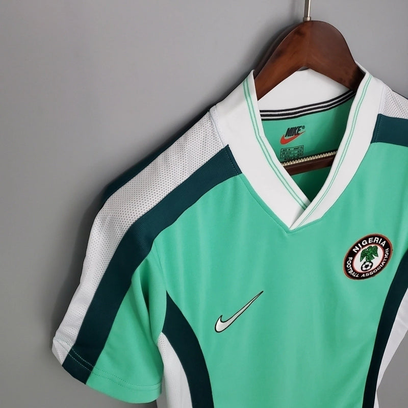 Camisa Nigéria Home I 1998/99 Nike Retrô Masculina verde, uniforme clássico das Super Eagles nos anos 90, modelo vintage histórico da seleção nigeriana de futebol”