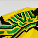 Camisa Jamaica Home I 1998/99 Kappa Retrô Masculina amarela – uniforme clássico da seleção jamaicana, modelo histórico da Copa do Mundo 1998 com detalhes verdes e pretos."