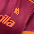 Camisa Roma Home I 1993/94 Adidas Retrô Masculina grená, com gola polo e detalhes em amarelo e laranja, escudo retrô bordado da Roma e logo Adidas clássico.