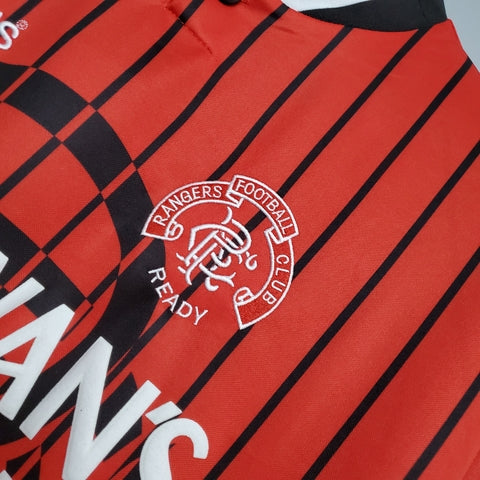 “Camisa Rangers FC Away II 1994/95 Adidas Retrô Masculina Laranja, uniforme retrô clássico do Rangers, design vibrante dos anos 90 e conforto para torcedores apaixonados.”