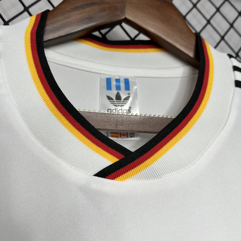 Camisa Alemanha Home I 1986/87 Adidas Retrô Masculina branca com detalhes em preto, tecido leve e respirável, corte masculino – perfeita para torcer, colecionar e uso casual.
