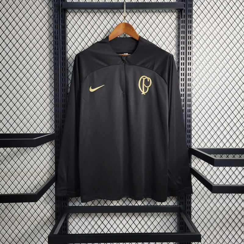 Camisa Corinthians treino 2023/24 Nike manhã longa preta com escudo dourado aplicado