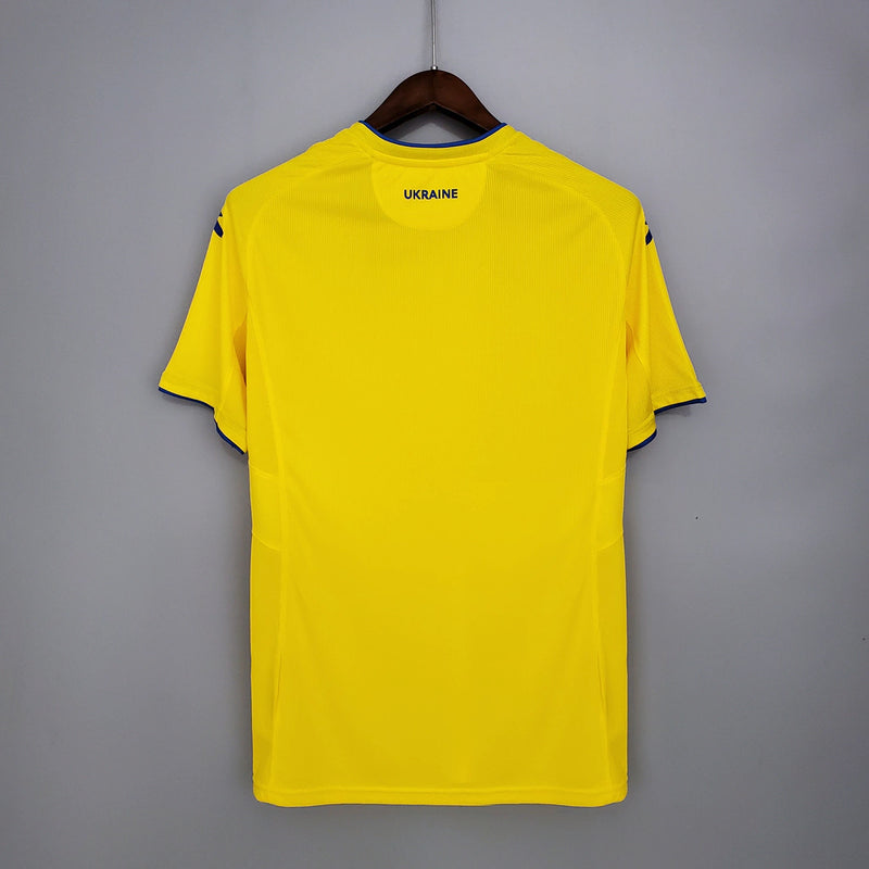 Camisa Ucrânia Home I 2020/21 masculina amarela com detalhes em azul, gola careca e tecido leve respirável para torcedores"