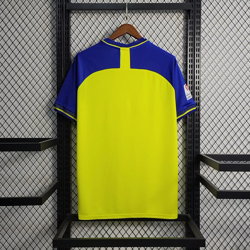 Camisa Al-Nassr Home 2022/23 Torcedor Masculina amarela da Adidas, modelo titular do time saudita, uniforme de futebol confortável em poliéster respirável, ideal para jogos, colecionadores e fãs do clube árabe.