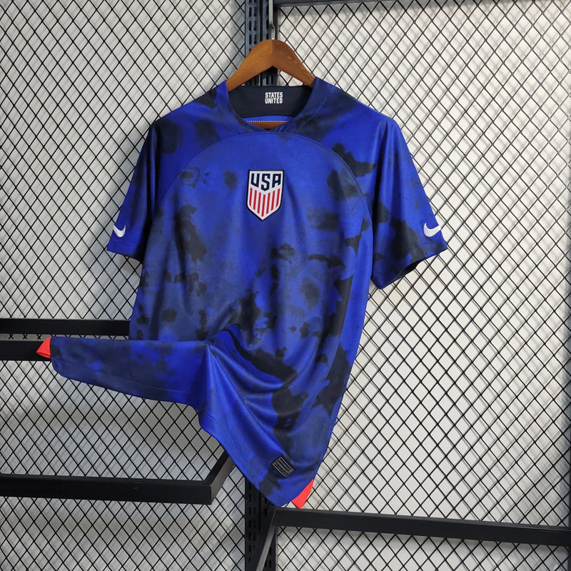 Camisa Estados Unidos Away II 2022/23 Nike Torcedor Masculina azul, uniforme alternativo USA soccer, escudo bordado no peito, tecido leve e respirável, corte masculino."
camisa Estados Unidos 2022/23 azul
camisa USA soccer Away masculina
camisa seleção EUA torcedor
uniforme alternativo Estados Unidos