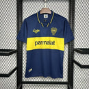 Camisa Boca Juniors Home (1) 1994/95 Olan Retrô Masculina azul com faixa amarela horizontal, escudo bordado tradicional e gola careca clássica.