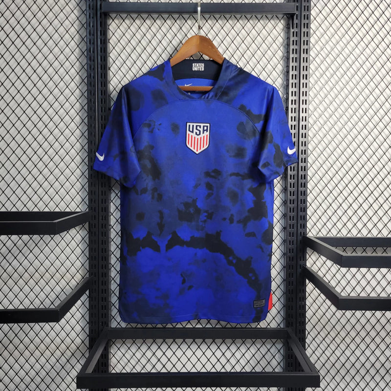 Camisa Estados Unidos Away II 2022/23 Nike Torcedor Masculina azul, uniforme alternativo USA soccer, escudo bordado no peito, tecido leve e respirável, corte masculino."
camisa Estados Unidos 2022/23 azul
camisa USA soccer Away masculina
camisa seleção EUA torcedor
uniforme alternativo Estados Unidos