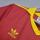 Camisa Roma Home I 1991/92 Adidas Retrô Masculina grená, com detalhes em amarelo dourado, gola polo e escudo bordado da Roma.