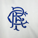 Camisa Rangers FC Away II 2023/24 Castore Torcedor Masculina Branca, uniforme moderno com escudo bordado e detalhes em azul e vermelho, conforto e elegância.”