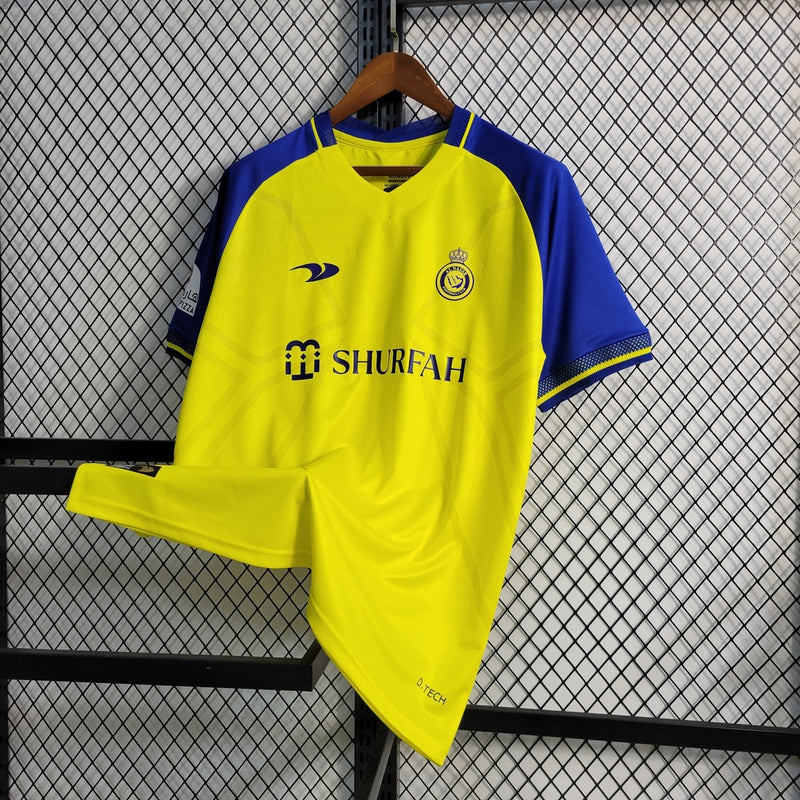 Camisa Al-Nassr Home 2022/23 Torcedor Masculina amarela da Adidas, modelo titular do time saudita, uniforme de futebol confortável em poliéster respirável, ideal para jogos, colecionadores e fãs do clube árabe.