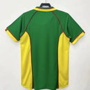 Camisa Camarões 1998/99 Puma Retrô Masculina verde, com detalhes em vermelho e amarelo da bandeira, design clássico dos Leões Indomáveis, ideal para colecionadores e torcedoresCamisa Camarões 1998/99
Camisa Camarões retrô verde
Camisa seleção Camarões histórica
Camisa Camarões Puma retrô
Camisa Leões Indomáveis retrô
Camisa Camarões uniforme vintage
Camisa Camarões clássica masculina
Camisa Camarões anos 90
Camisa Camarões coleção retrô