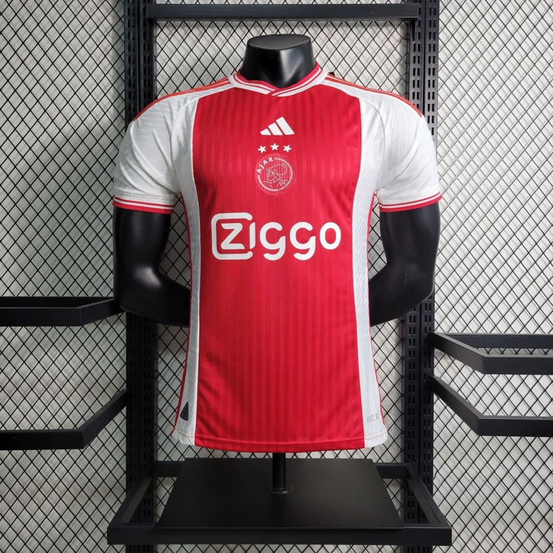 Camisa Ajax Home (1) 2023/24 Adidas Jogador Masculina original, modelo Player Issue branco com faixa vermelha central, tecnologia HEAT.RDY, versão oficial usada pelos atletas."